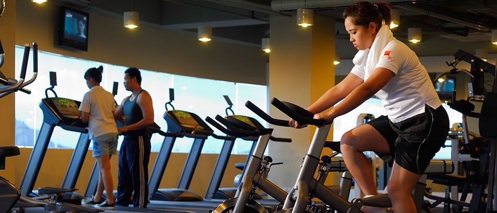 Micasa All Suites Hotel Kuala Lumpur Eksteriør billede A woman on a stationary bicycle